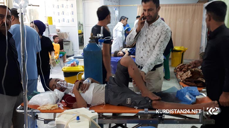 A mini bus carrying two Iraqi tourist families drove off a mountainous road in the Kurdistan Region, killing and injured tens of people  Aug. 30, 2019. (Photo: Kurdistan 24/Karwan Yara)